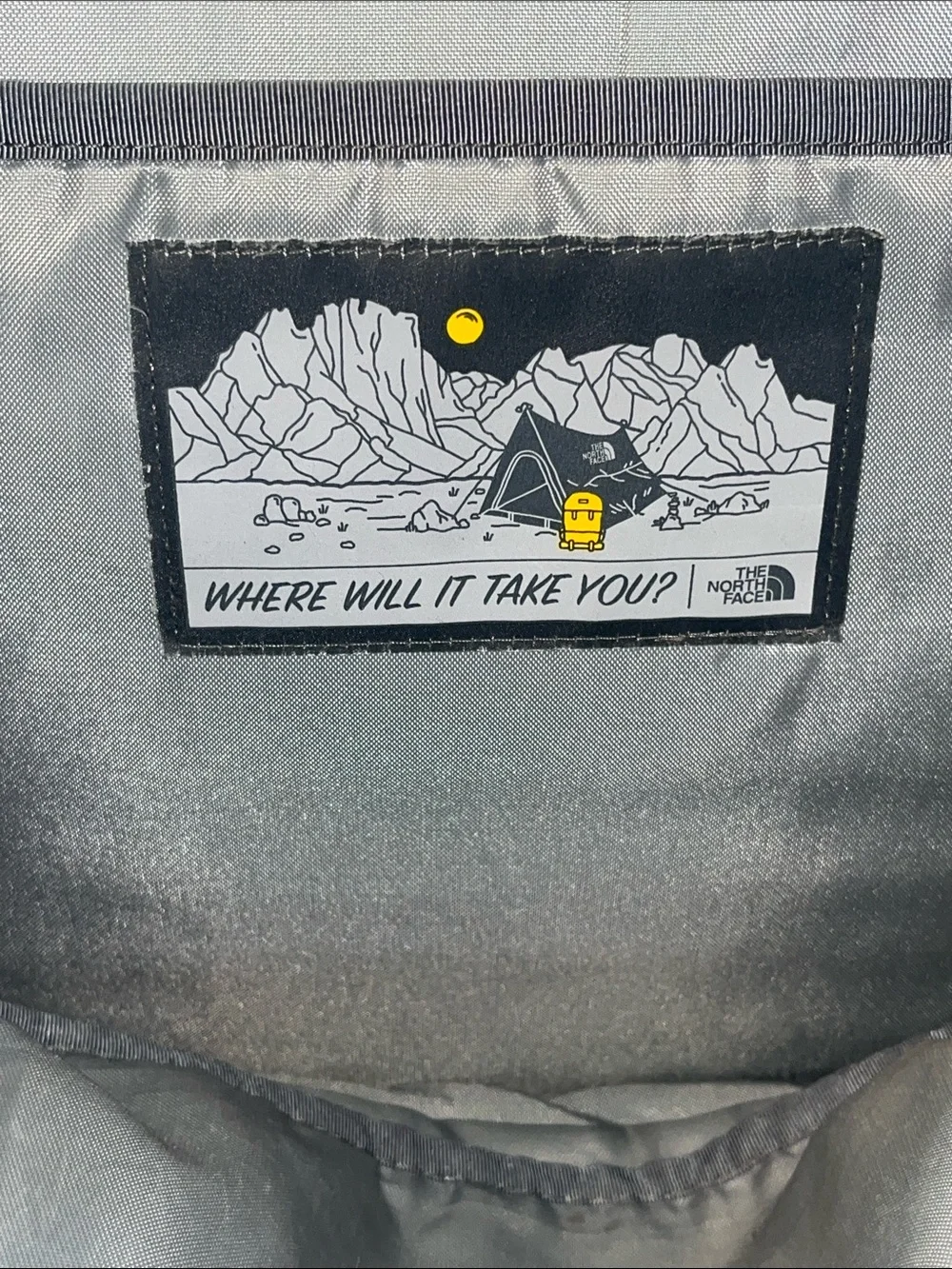 The NorthFace Jester Black Backpack with Light Pink Bungee Cord